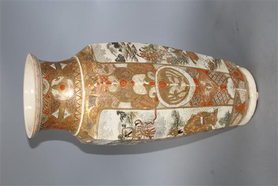 A Satsuma hexagonal vase, decorated with panels of figures in landscapes, height 46cm